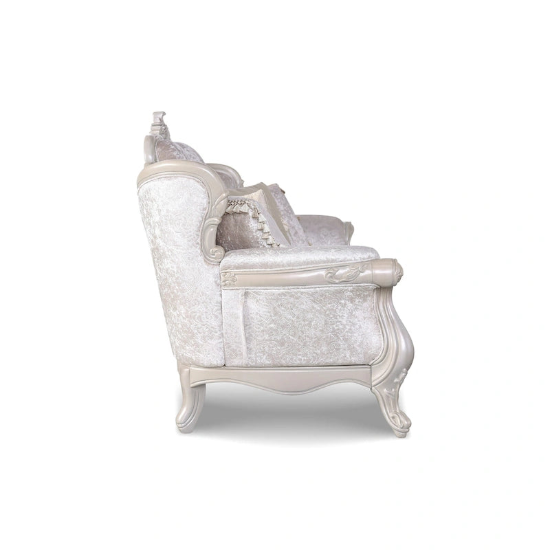 Traditional-style two-seater sofa featuring a button-tufted backrest and decorative throw pillows.